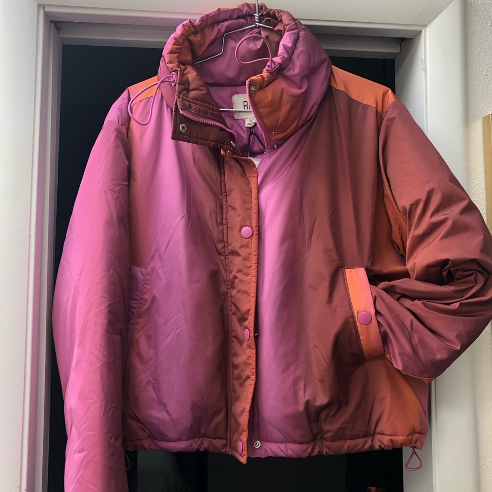 Urban Outfitters orange and pink puffer jacket